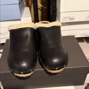 Bash Chean black clogs with Sherpa lining